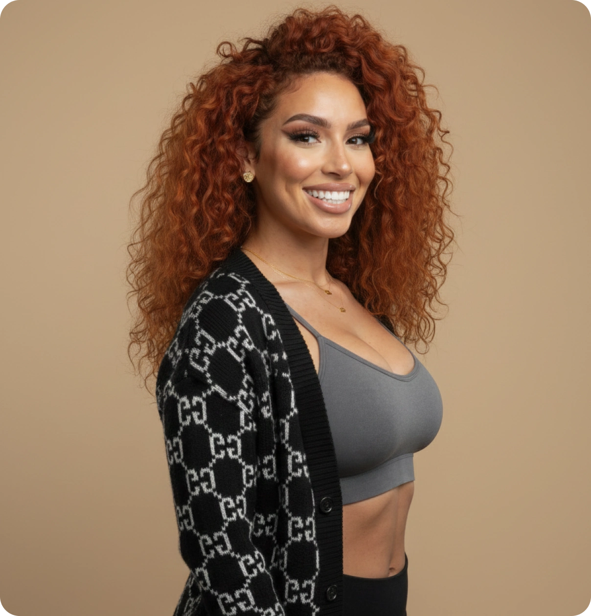 woman with curly hair smiling